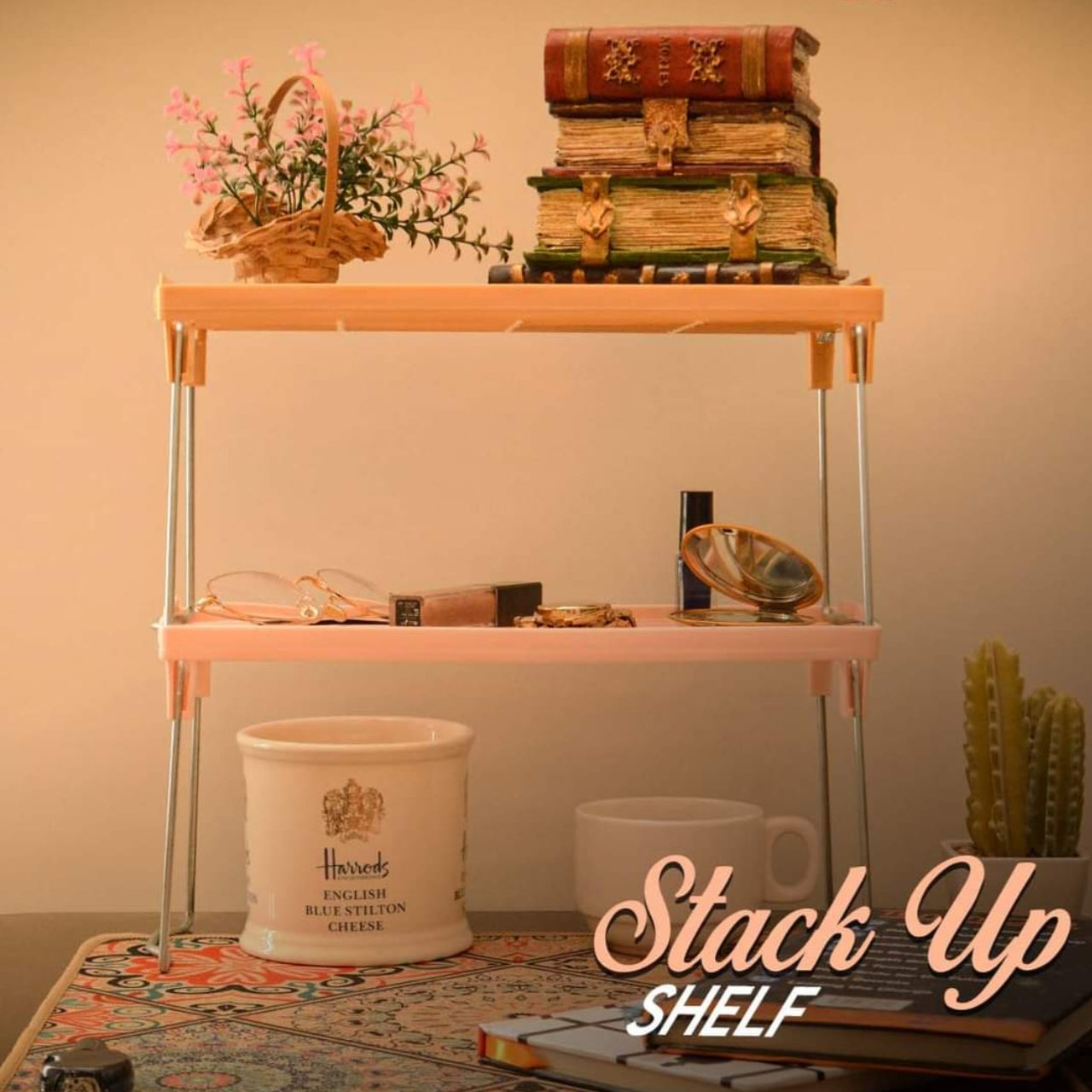 Folding stack-up shelf kitchen organizer with jars and cups neatly arranged