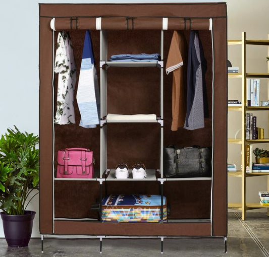 3-door foldable portable wardrobe with shelves set up in a bedroom
