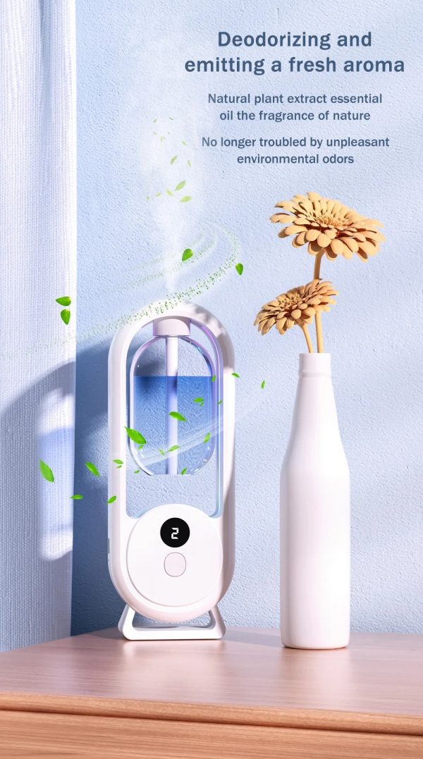 Rechargeable aroma diffuser next to folded towels in bathroom decor